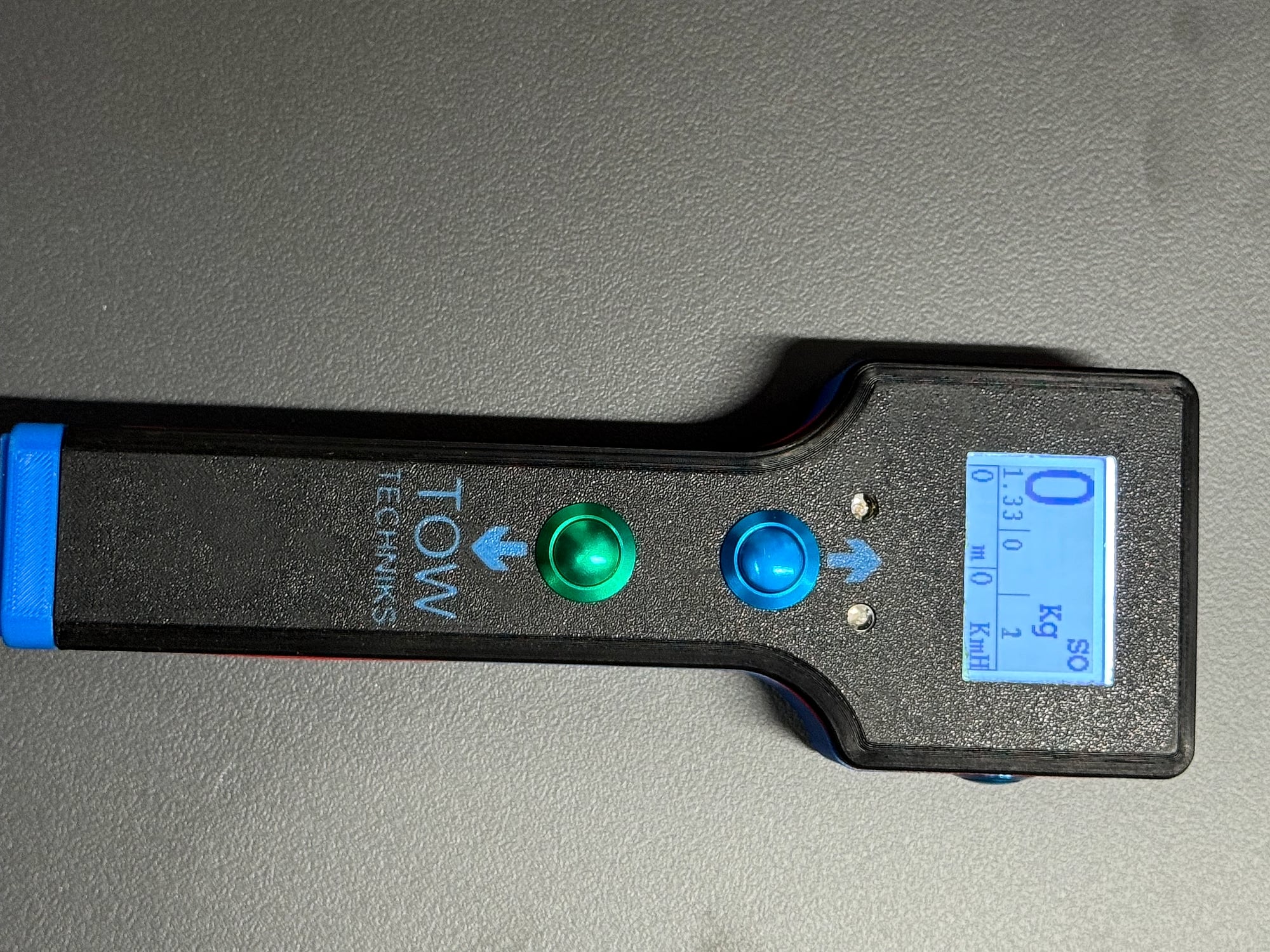 The remote control display in use, showing tension and speed